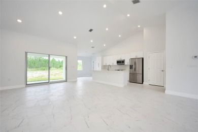 Beautiful new construction in Indian Lake Estates! A golf and on Indian Lake Estates Golf and Country Club in Florida - for sale on GolfHomes.com, golf home, golf lot