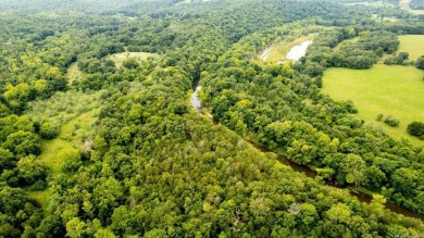 Creekfront Acreage for Sale in Hardy Arkansas! Escape to this on Cherokee Village North Course in Arkansas - for sale on GolfHomes.com, golf home, golf lot