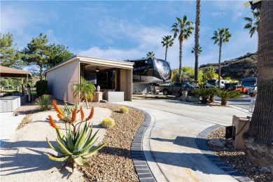 Site 246 has the perfect Sun Rise, water and Golf Views.  Patio on Rancho California RV Resort in California - for sale on GolfHomes.com, golf home, golf lot