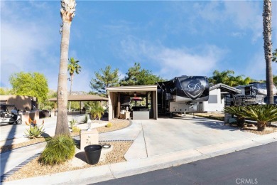Site 246 has the perfect Sun Rise, water and Golf Views.  Patio on Rancho California RV Resort in California - for sale on GolfHomes.com, golf home, golf lot