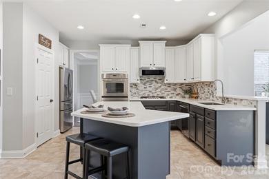 Amazing 2 Story home with a finished BASEMENT in the sought on Highland Creek Golf Club in North Carolina - for sale on GolfHomes.com, golf home, golf lot