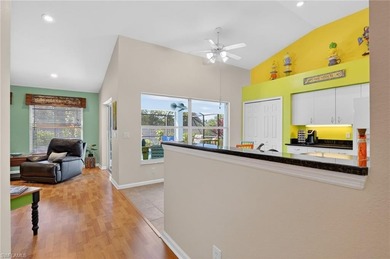 Welcome home to this beautiful Florida retreat with breezy Key on Fountain Lakes Community Golf Course in Florida - for sale on GolfHomes.com, golf home, golf lot