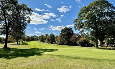 Move right into this bright unit desirably situated directly on on Oronoque Country Club in Connecticut - for sale on GolfHomes.com, golf home, golf lot