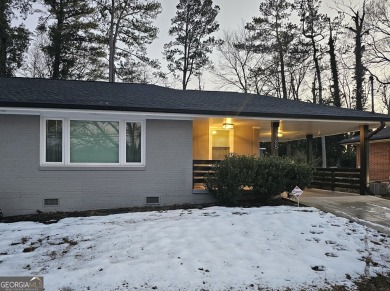 Welcome to this charming 3-bedroom, 2-bath home in the heart of on Charlie Yates Golf Course in Georgia - for sale on GolfHomes.com, golf home, golf lot