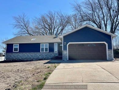 Welcome to your remodeled 3 bed, 3 bath home walking distance to on Poco Creek Golf Course (Aurora Country Club) in Nebraska - for sale on GolfHomes.com, golf home, golf lot