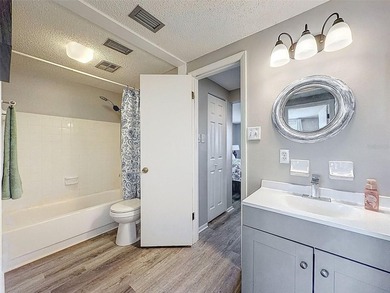 Enjoy peaceful golf course living in the highly sought-after on Seven Springs Golf and Country Club in Florida - for sale on GolfHomes.com, golf home, golf lot