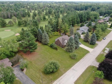 Located in highly desirable subdivision along the golf course, a on Alpena Golf Course in Michigan - for sale on GolfHomes.com, golf home, golf lot