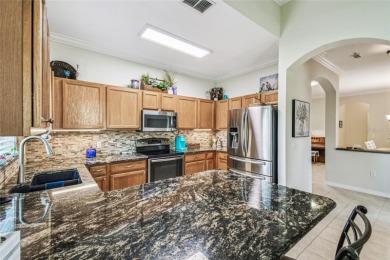Beautiful Melody Model with 3 Bedrooms, 2 Baths and Stunning on Stonegate Golf Club in Florida - for sale on GolfHomes.com, golf home, golf lot
