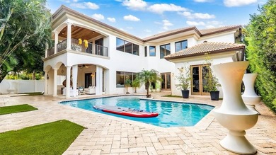 Luxury single-family home in Coral Ridge Estates within the on Coral Ridge Country Club in Florida - for sale on GolfHomes.com, golf home, golf lot