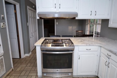 Welcome to this massive, gorgeous, and updated two-story estate on Huntington Park Golf Course in Louisiana - for sale on GolfHomes.com, golf home, golf lot