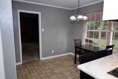 Welcome to this massive, gorgeous, and updated two-story estate on Huntington Park Golf Course in Louisiana - for sale on GolfHomes.com, golf home, golf lot