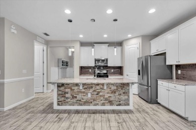 One or more photo(s) has been virtually staged. Step into this on Esplanade Golf and Country at Lakewood Ranch in Florida - for sale on GolfHomes.com, golf home, golf lot