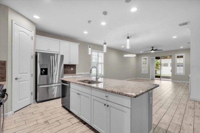 One or more photo(s) has been virtually staged. Step into this on Esplanade Golf and Country at Lakewood Ranch in Florida - for sale on GolfHomes.com, golf home, golf lot