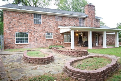 Welcome to this massive, gorgeous, and updated two-story estate on Huntington Park Golf Course in Louisiana - for sale on GolfHomes.com, golf home, golf lot