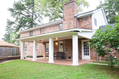 Welcome to this massive, gorgeous, and updated two-story estate on Huntington Park Golf Course in Louisiana - for sale on GolfHomes.com, golf home, golf lot