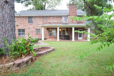 Welcome to this massive, gorgeous, and updated two-story estate on Huntington Park Golf Course in Louisiana - for sale on GolfHomes.com, golf home, golf lot