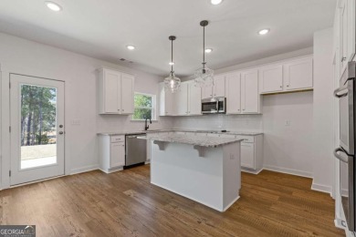 Live the Resort Lifestyle in the Stunning Southport Model by on Traditions of Braselton Golf Club in Georgia - for sale on GolfHomes.com, golf home, golf lot