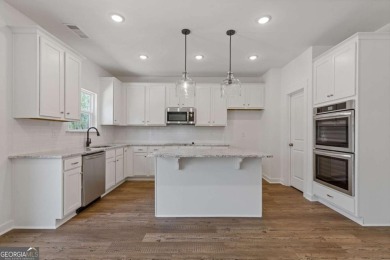 Live the Resort Lifestyle in the Stunning Southport Model by on Traditions of Braselton Golf Club in Georgia - for sale on GolfHomes.com, golf home, golf lot