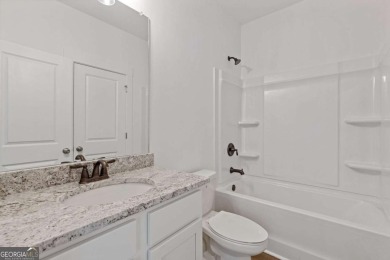 Live the Resort Lifestyle in the Stunning Southport Model by on Traditions of Braselton Golf Club in Georgia - for sale on GolfHomes.com, golf home, golf lot