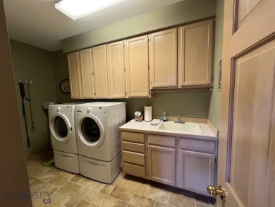 Nestled in one of Bozeman's most sought-after townhome on Riverside Country Club in Montana - for sale on GolfHomes.com, golf home, golf lot