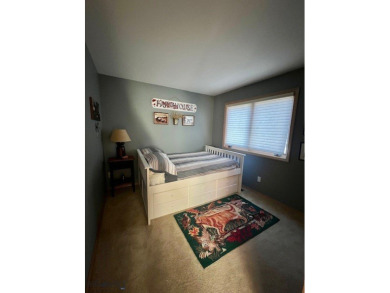 Nestled in one of Bozeman's most sought-after townhome on Riverside Country Club in Montana - for sale on GolfHomes.com, golf home, golf lot