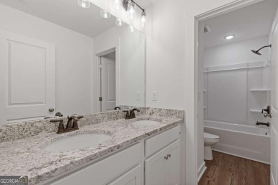 Live the Resort Lifestyle in the Stunning Southport Model by on Traditions of Braselton Golf Club in Georgia - for sale on GolfHomes.com, golf home, golf lot