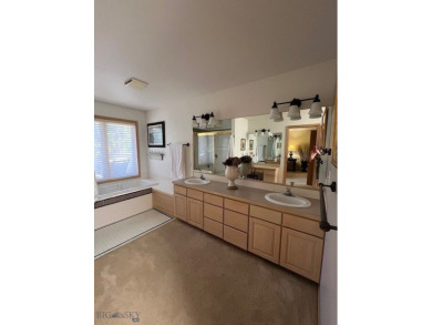 Nestled in one of Bozeman's most sought-after townhome on Riverside Country Club in Montana - for sale on GolfHomes.com, golf home, golf lot