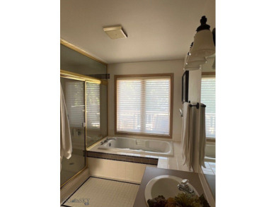 Nestled in one of Bozeman's most sought-after townhome on Riverside Country Club in Montana - for sale on GolfHomes.com, golf home, golf lot