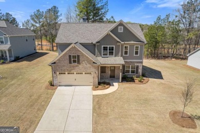 Live the Resort Lifestyle in the Stunning Southport Model by on Traditions of Braselton Golf Club in Georgia - for sale on GolfHomes.com, golf home, golf lot