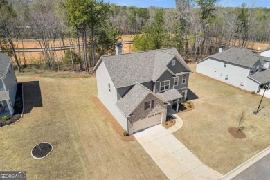 Live the Resort Lifestyle in the Stunning Southport Model by on Traditions of Braselton Golf Club in Georgia - for sale on GolfHomes.com, golf home, golf lot