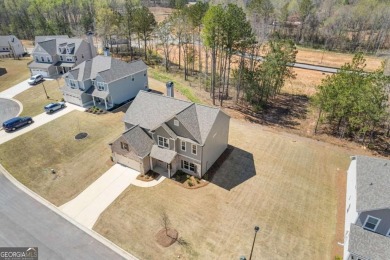 Live the Resort Lifestyle in the Stunning Southport Model by on Traditions of Braselton Golf Club in Georgia - for sale on GolfHomes.com, golf home, golf lot