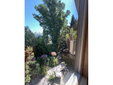 Nestled in one of Bozeman's most sought-after townhome on Riverside Country Club in Montana - for sale on GolfHomes.com, golf home, golf lot