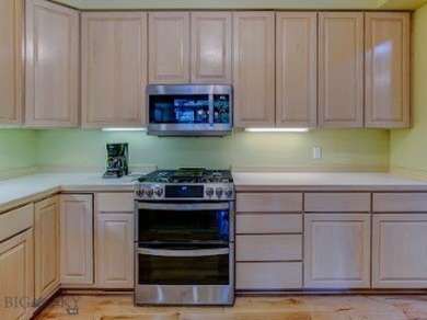 Nestled in one of Bozeman's most sought-after townhome on Riverside Country Club in Montana - for sale on GolfHomes.com, golf home, golf lot