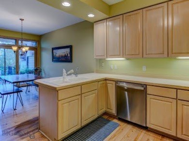 Nestled in one of Bozeman's most sought-after townhome on Riverside Country Club in Montana - for sale on GolfHomes.com, golf home, golf lot