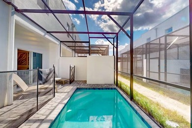 Nestled in the Contemporary development of The Azur Resort, this on Reunion Resort Golf Course in Florida - for sale on GolfHomes.com, golf home, golf lot