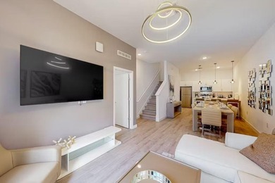 Nestled in the Contemporary development of The Azur Resort, this on Reunion Resort Golf Course in Florida - for sale on GolfHomes.com, golf home, golf lot