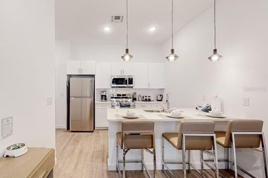 Nestled in the Contemporary development of The Azur Resort, this on Reunion Resort Golf Course in Florida - for sale on GolfHomes.com, golf home, golf lot