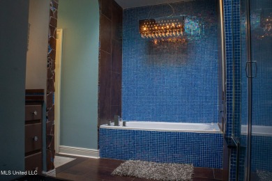 Wall to wall glam! If you are waiting for something really on Colonial Country Club Deerfield in Mississippi - for sale on GolfHomes.com, golf home, golf lot