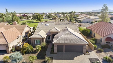 Nestled in a vibrant gated active adult community, this stunning on Palo Verde Golf and Country Club in Arizona - for sale on GolfHomes.com, golf home, golf lot