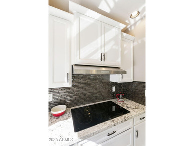 Nestled in a vibrant gated active adult community, this stunning on Palo Verde Golf and Country Club in Arizona - for sale on GolfHomes.com, golf home, golf lot