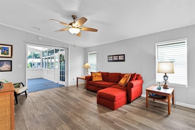 Discover this beautifully updated split-bedroom home featuring on Barefoot Bay Golf Course in Florida - for sale on GolfHomes.com, golf home, golf lot