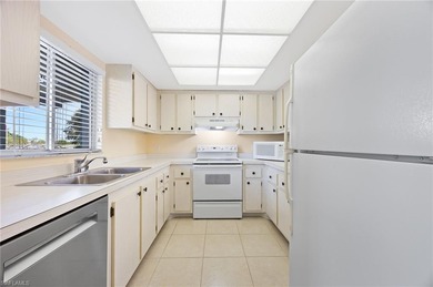 Welcome home to this bright and sunny second-floor, 2-bedroom on Royal Palm Golf Club in Florida - for sale on GolfHomes.com, golf home, golf lot