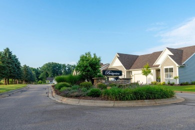 Welcome home to low maintenance condo living just steps away on Angels Crossing Golf Club in Michigan - for sale on GolfHomes.com, golf home, golf lot