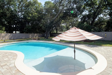 Welcome home to 606 Powell Drive in the heart of Fort Walton on Fort Walton Beach Golf Course in Florida - for sale on GolfHomes.com, golf home, golf lot