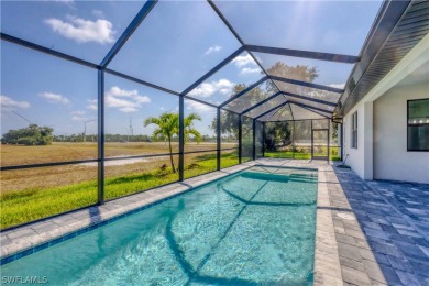 Pool home on an oversize X zone corner lot. 2,112 sq. ft of on Burnt Store Golf Club in Florida - for sale on GolfHomes.com, golf home, golf lot