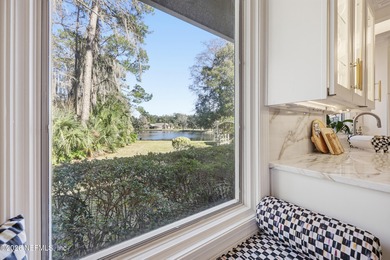 Experience refined mid-century modern living in one of the most on The Deerwood Country Club in Florida - for sale on GolfHomes.com, golf home, golf lot