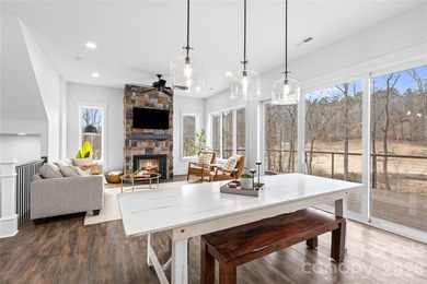 Experience modern elegance and breathtaking golf course views in on Verdict Ridge Golf and Country Club in North Carolina - for sale on GolfHomes.com, golf home, golf lot