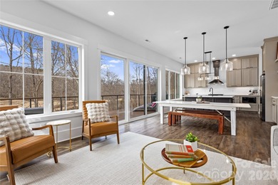 Experience modern elegance and breathtaking golf course views in on Verdict Ridge Golf and Country Club in North Carolina - for sale on GolfHomes.com, golf home, golf lot