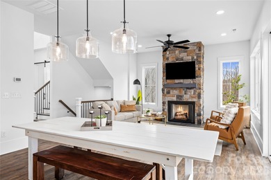 Experience modern elegance and breathtaking golf course views in on Verdict Ridge Golf and Country Club in North Carolina - for sale on GolfHomes.com, golf home, golf lot