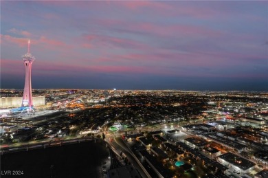 This stunning 3-bedroom condo boasts floor-to-ceiling panoramic on Las Vegas Country Club in Nevada - for sale on GolfHomes.com, golf home, golf lot